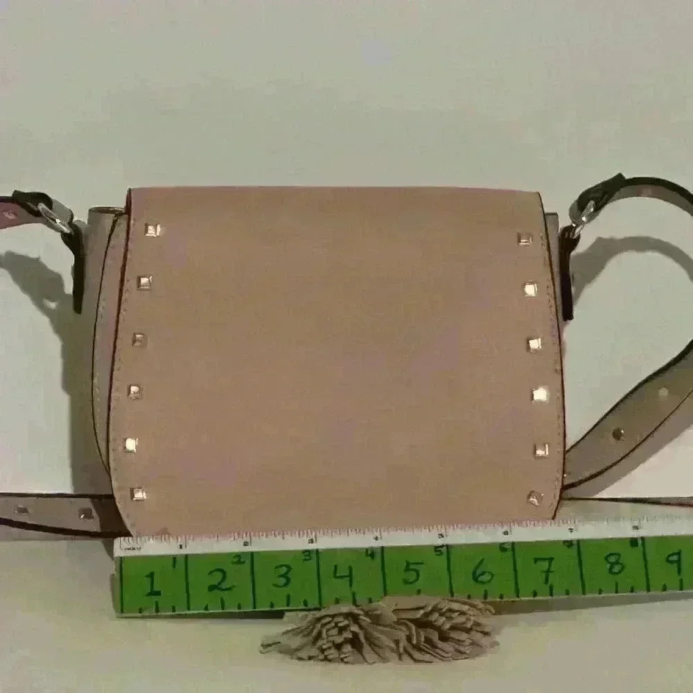 A Victoria’s Secret light pink crossbody bag w/ tassels. - Picture 7 of 9